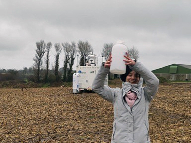 Patricia Gribi collecting rain samples