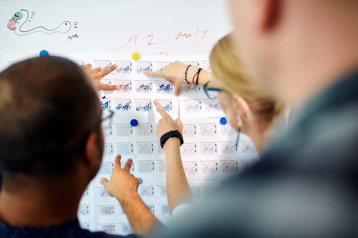 Group of researchers discussing