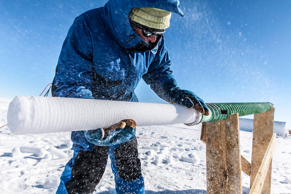 Researcher with an ice core